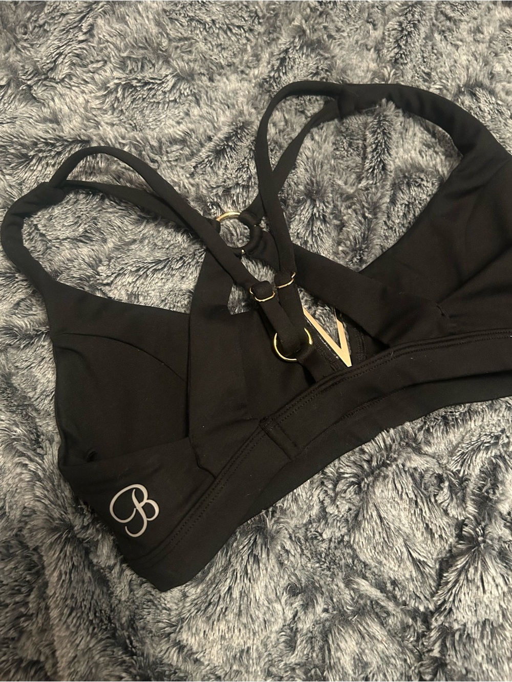 Bombshell Sportswear Black Strappy Sports Bra with Gold Accents